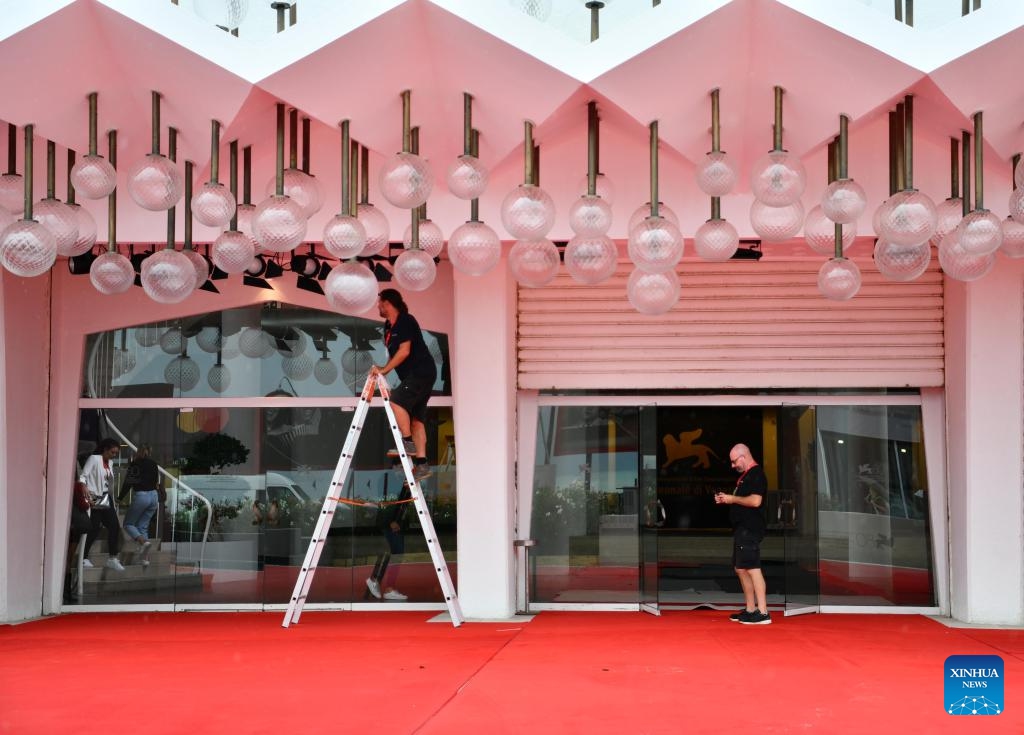 Employees prepare for the opening ceremony of the 80th Venice International Film Festival in Venice, Italy, on Aug. 29, 2023. The 80th Venice International Film Festival will kick off here on Aug. 30.(Photo: Xinhua)