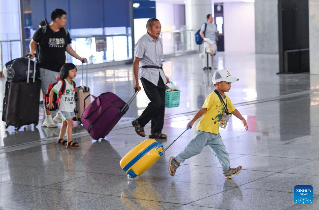 Passengers walk at the waiting hall of Chongqing North Railway Station in Chongqing, southwest China, Aug. 31, 2023. The 62-day summer travel rush officially concluded on Thursday.(Photo: Xinhua)