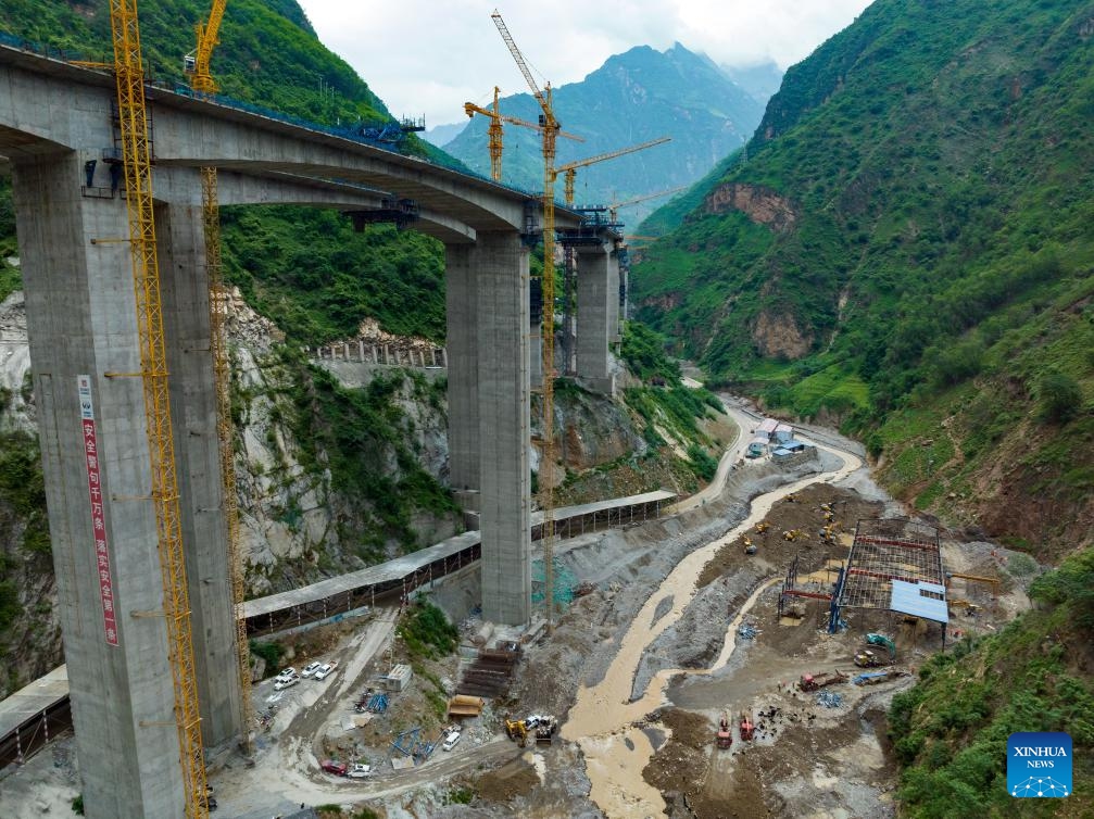 This aerial photo taken on Aug. 30, 2023 shows rescuers working at the make-shift houses of the workers in the steel bar processing site of the Shudao Group that was undertaking the highway construction project in the lower reaches of the Lugaolin River in Jinyang County of Liangshan Yi Autonomous Prefecture, southwest China's Sichuan Province.(Photo: Xinhua)