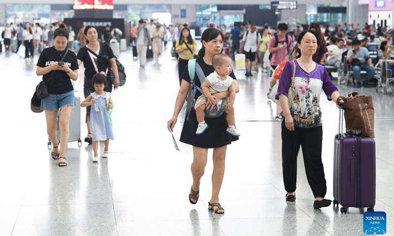 Passengers walk at the waiting hall of Chongqing North Railway Station in Chongqing, southwest China, Aug. 31, 2023. The 62-day summer travel rush officially concluded on Thursday.(Photo: Xinhua)