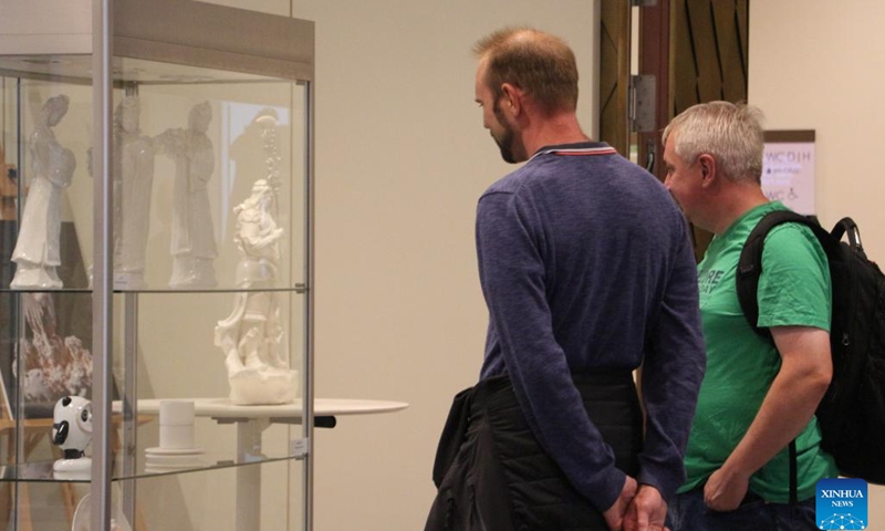 Visitors view exhibits during an itinerant exhibition of Chinese Dehua white porcelain in Frankfurt, Germany, Aug. 29, 2023. An exhibition of the famous Chinese Dehua white porcelain is in full swing at the Stadthaus in Frankfurt, Germany. Over 90 items of Dehua white porcelain, known to European customers as Blanc de Chine, are on display at the exhibition.(Photo: Xinhua)