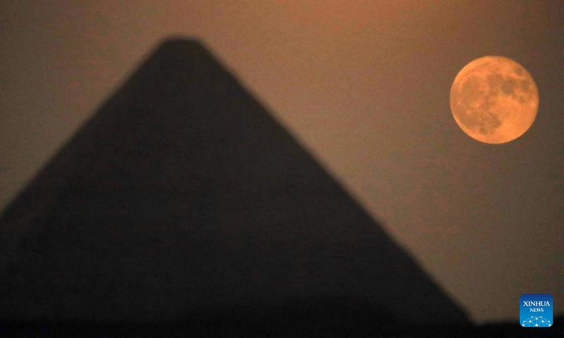 A supermoon is seen in the sky over the Khufu Pyramid in Giza, Egypt, on Aug. 31, 2023.(Photo: Xinhua)