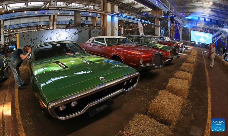 People visit a show of vintage vehicles in Minsk, Belarus, Sept. 2, 2023. About 200 vintage vehicles were on display here on Saturday. Photo: Xinhua