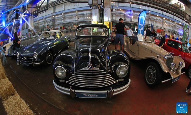 People visit a show of vintage vehicles in Minsk, Belarus, Sept. 2, 2023. About 200 vintage vehicles were on display here on Saturday. Photo: Xinhua