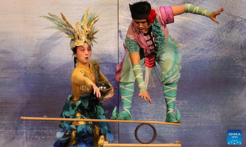 Acrobats from China's Hunan Acrobatic Art Theater perform during the acrobatic show Dream Journey at EDP Gran Via Theater in Madrid, Spain, Sept. 3, 2023. The 700th performance of the global tour of Dream Journey was held here on Sunday.(Photo: Xinhua)