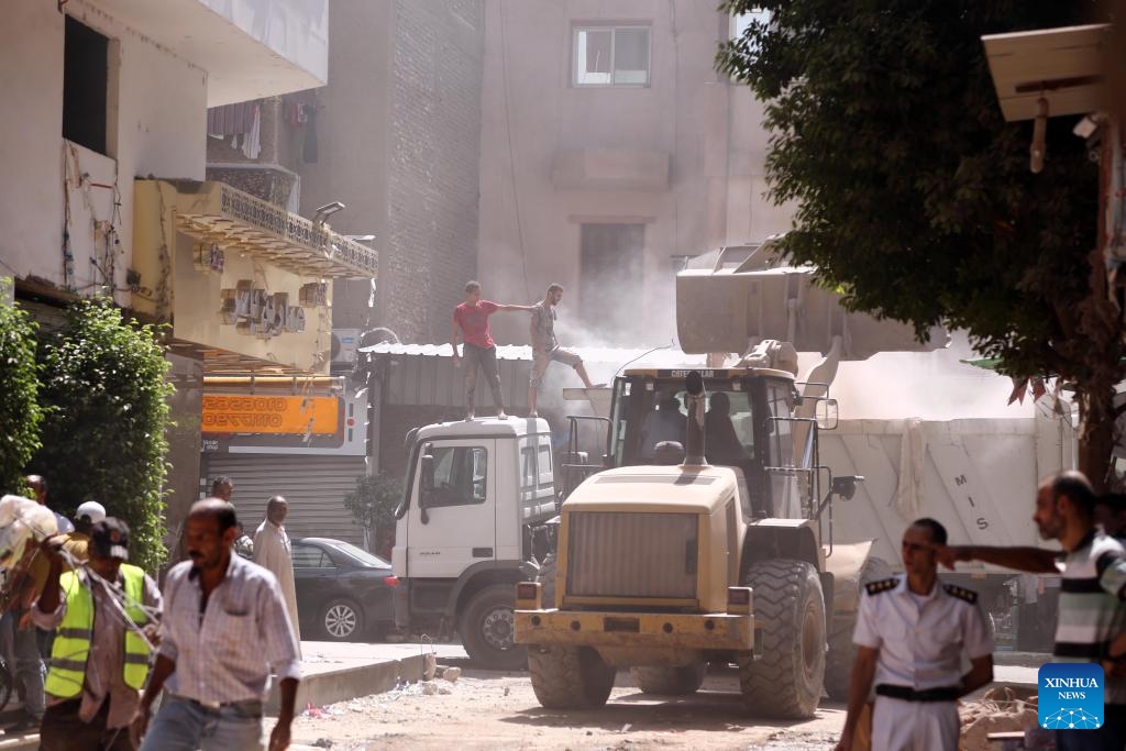 Rescuers work at the site of a collapsed building in Cairo, Egypt, Sept. 6, 2023. At least four people were killed and five others wounded on Wednesday in a building collapse in Egypt's capital Cairo, the state-run Ahram newspaper reported.(Photo: Xinhua)