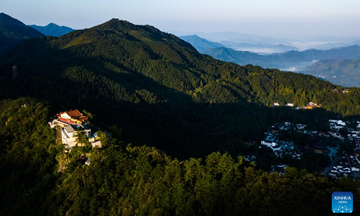 This aerial photo taken on Sep 9, 2023 shows the scenery of Jiuhua Mountain at sunrise in Qingyang County of Chizhou, east China's Anhui Province. Jiuhua Mountain is one of the four sacred mountains of Chinese Buddhism and is also a national geological park. Photo:Xinhua