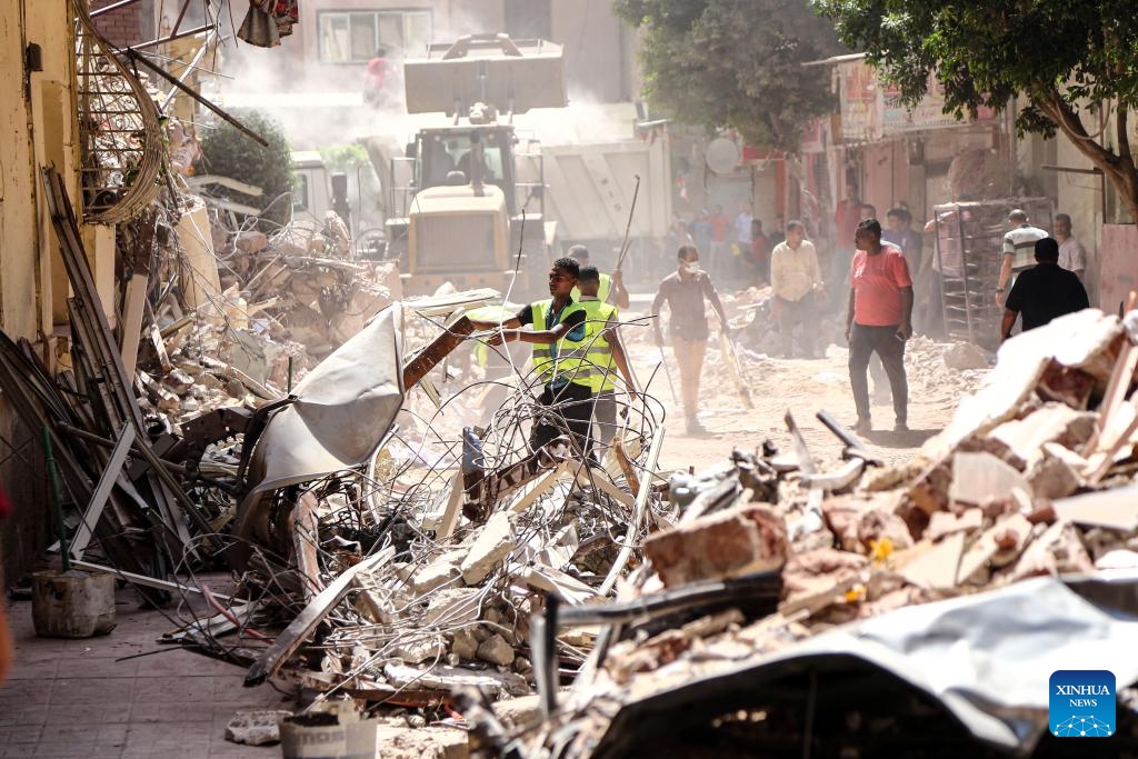 Rescuers work at the site of a collapsed building in Cairo, Egypt, Sept. 6, 2023. At least four people were killed and five others wounded on Wednesday in a building collapse in Egypt's capital Cairo, the state-run Ahram newspaper reported.(Photo: Xinhua)