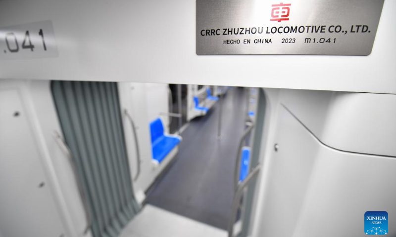 This photo taken on Sept. 9, 2023 shows the interior view of the first articulated light rail train customized by CRRC Zhuzhou Locomotive Co., Ltd. for Mexico City, in Zhuzhou, central China's Hunan Province. The first articulated light rail train customized by CRRC Zhuzhou Locomotive Co., Ltd. for Mexico City has rolled off the assembly line on Saturday. (Xinhua/Chen Zeguo)