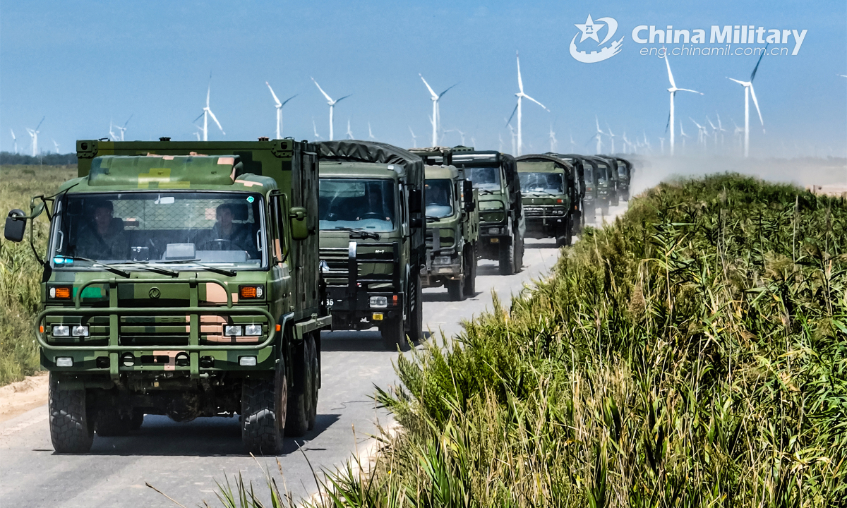 A line of military vehicles attached to a brigade under the PLA 73rd Group Army moves to designated area during a force-on-force live-fire training exercise. The exercise, held in recent days, verified the troops' ability to use different weapons, equipment and ammunitions. Photo:China Military