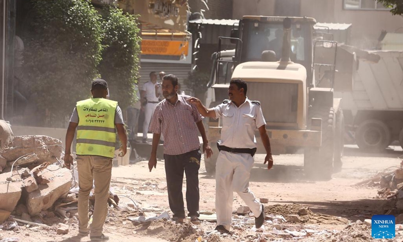 Rescuers work at the site of a collapsed building in Cairo, Egypt, Sept. 6, 2023. At least four people were killed and five others wounded on Wednesday in a building collapse in Egypt's capital Cairo, the state-run Ahram newspaper reported.(Photo: Xinhua)