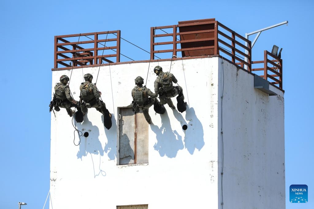 Members of the Lucko Anti-terrorist Unit take part in a demonstration exercise in Zagreb, Croatia, on Sept. 7, 2023. The 33rd anniversary of the founding of the Croatian special police Lucko anti-terrorist unit was celebrated here on Thursday.(Photo: Xinhua)