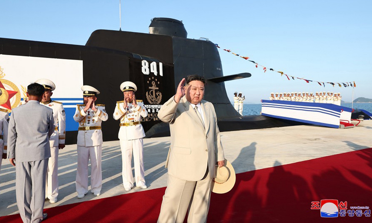 This image, released on September 8, 2023, by the North Korean Official News Service (KCNA), shows North Korean leader Kim Jong Un during the launch of the country's first tactical nuclear attack submarine at Sinpho shipyard. According to KCNA, the tactical nuclear attack submarine, No. 841, the first of its kind, was transferred to the East Sea Fleet of the KPA Navy and named the Hero Kim Kun Ok. Photo: IC