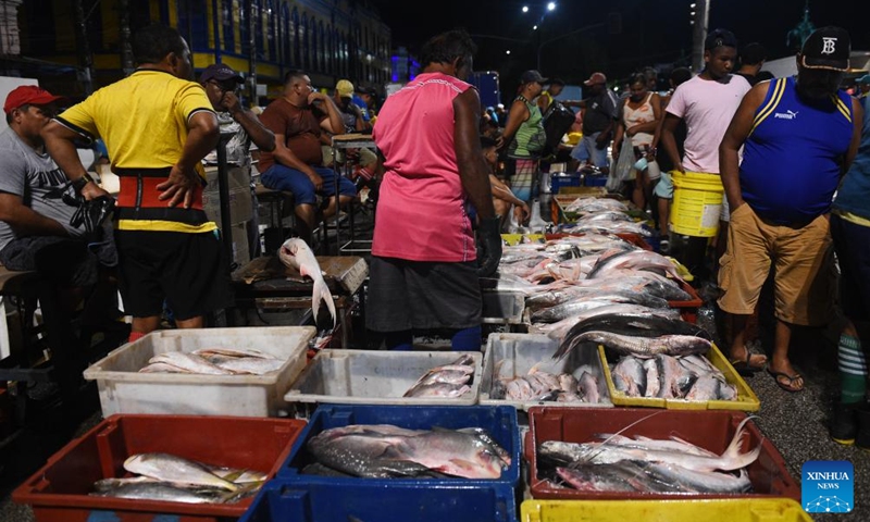 People walk at Ver-o-Peso fish market in Belem, state of Para, Brazil, Sept. 9, 2023. Photo: Xinhua