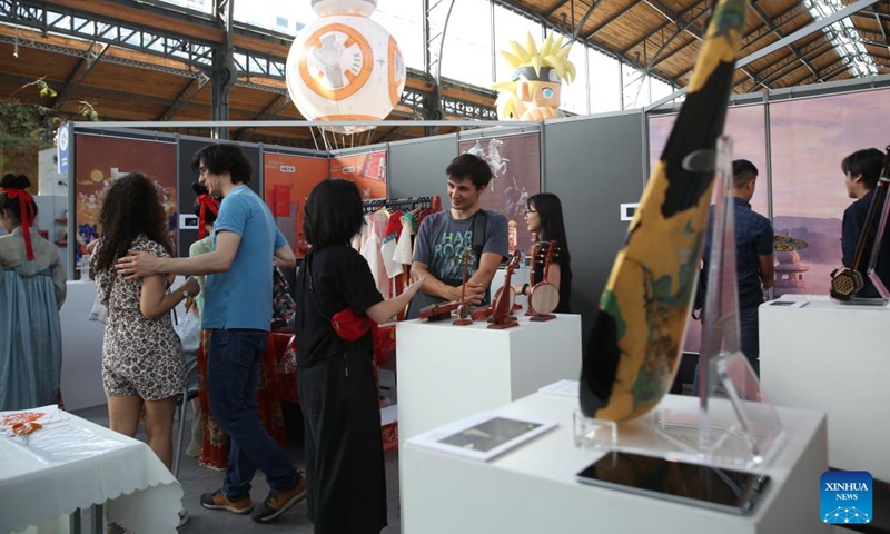 People visit the Chinese Pavilion at the Brussels Comic Strip Festival in Brussels, Belgium, on Sept. 8, 2023. The Chinese Pavilion opened its exhibition to the public on Friday during the Brussels Comic Strip Festival from Sept. 8 to 10. Photo: Xinhua