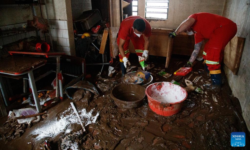 Rescue workers clear mud and debris in a school at the city of Mucum, Rio Grande do Sul, Brazil, on Sept. 9, 2023. Photo: Xinhua