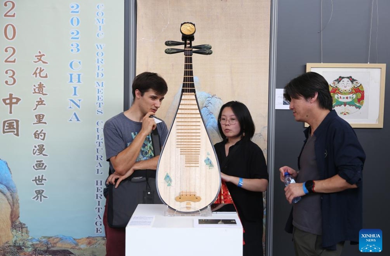 People visit the Chinese Pavilion at the Brussels Comic Strip Festival in Brussels, Belgium, on Sept. 8, 2023. The Chinese Pavilion opened its exhibition to the public on Friday during the Brussels Comic Strip Festival from Sept. 8 to 10. Photo: Xinhua