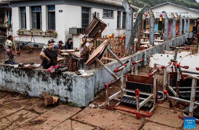 People clean up a school at the city of Mucum, Rio Grande do Sul, Brazil, on Sept. 9, 2023. Photo: Xinhua