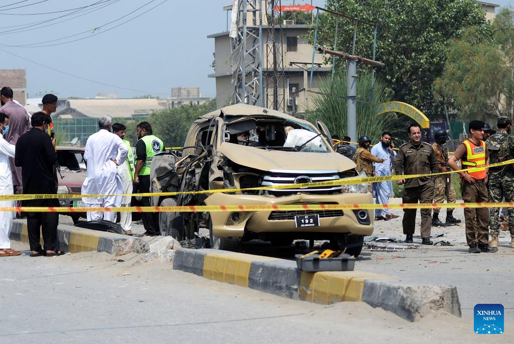 Security personnel examine the explosion site in northwest Pakistan's Peshawar on Sept. 11, 2023. Seven security members and four civilians were injured when a bomb went off in Pakistan's northwest Khyber Pakhtunkhwa province on Monday, rescue teams and police said.(Photo: Xinhua)