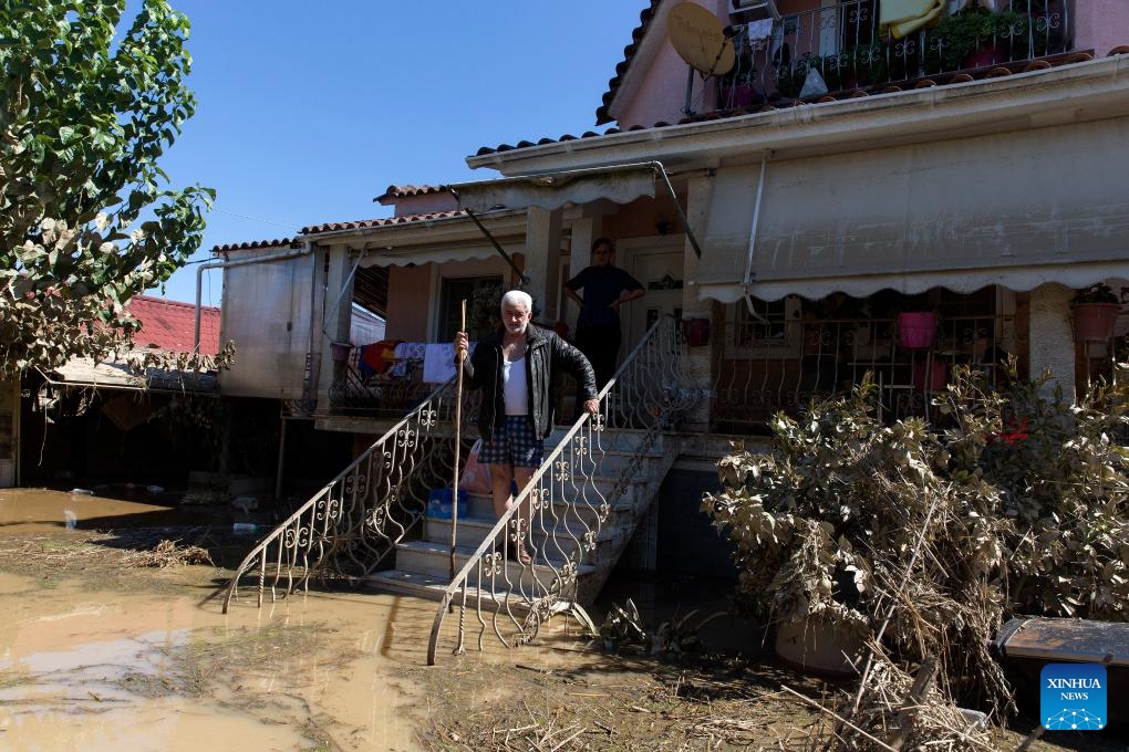 A couple awaits supplies in the village of Metamorfosi, Karditsa, Greece, on Sept. 12, 2023. Regions in central Greece are on alert for the impact of the recent floods on public health, local officials said on Tuesday. Fifteen people died and 4,570 were evacuated to safety during the floods, according to the Fire Brigade.(Photo: Xinhua)