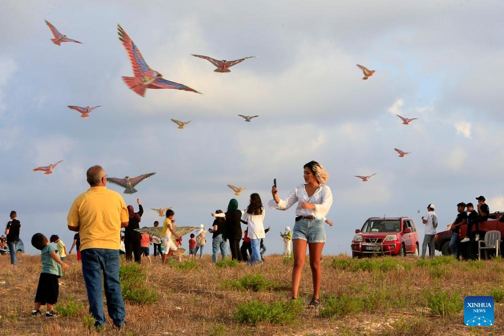 People fly kites during a kite festival in the town of Zrarieh, Lebanon, on Sept. 10, 2023.(Photo: Xinhua)