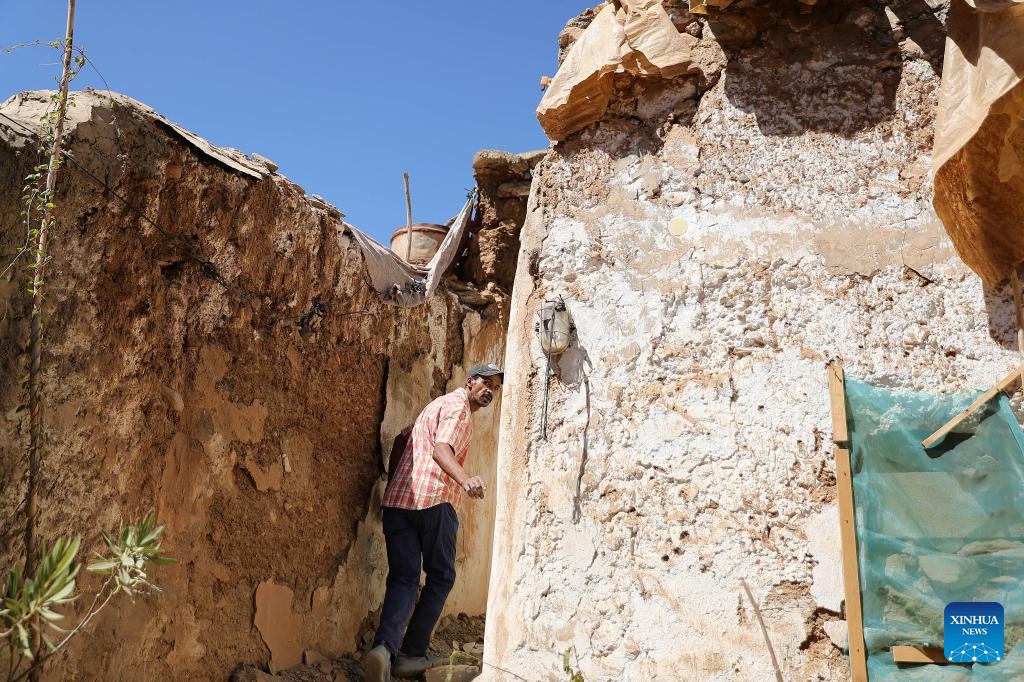 A man checks the damage to his house after an earthquake in Amizmiz, Morocco, Sept. 10, 2023. The death toll from the deadly earthquake in Morocco has risen to 2,497, with another 2,467 people injured, according to the latest update from the Moroccan Interior Ministry on Monday(Photo: Xinhua)