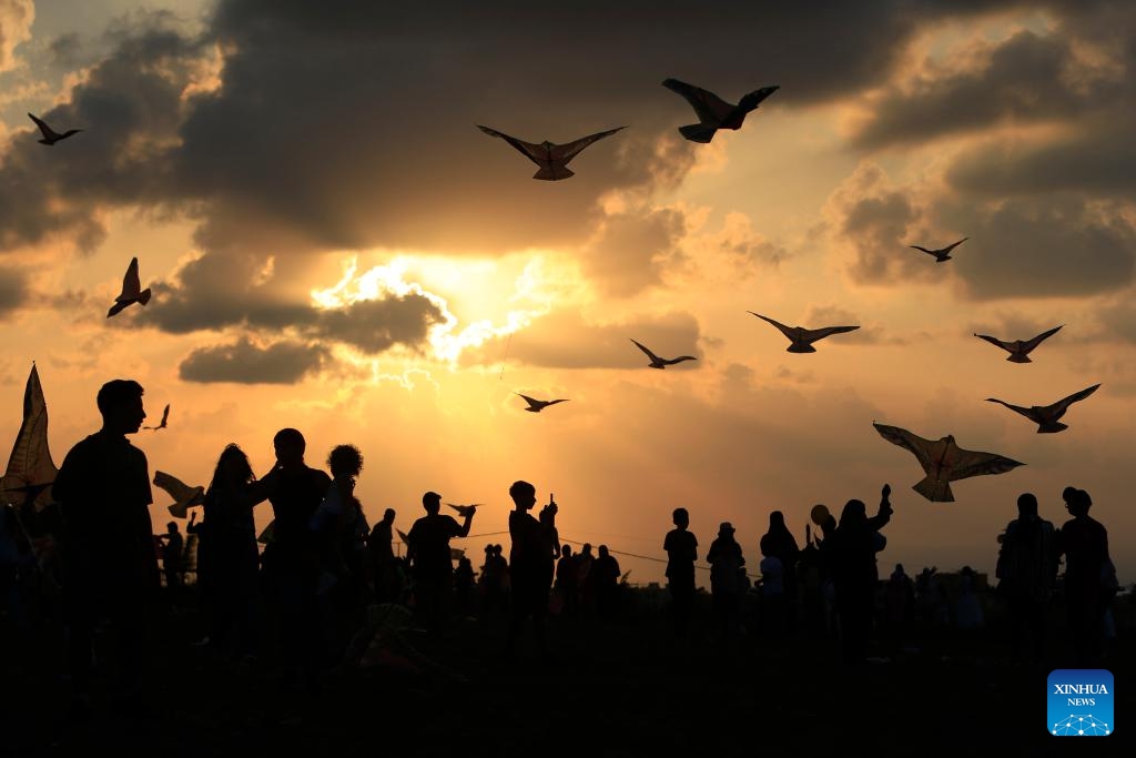 People fly kites during a kite festival in the town of Zrarieh, Lebanon, on Sept. 10, 2023.(Photo: Xinhua)