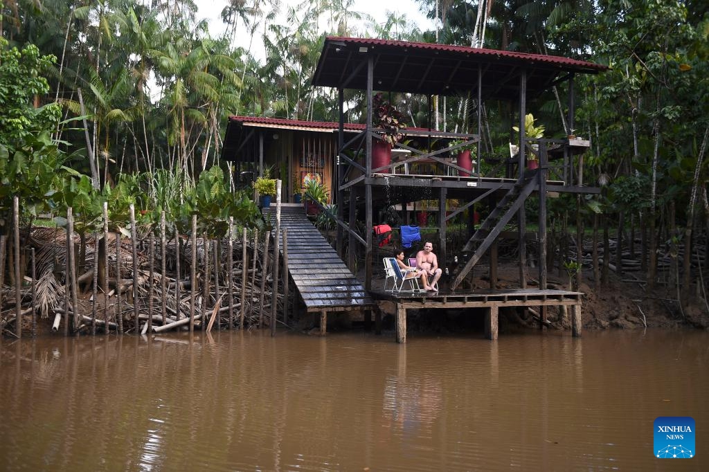 People are pictured at a house at the Guama River in Belem, state of Para, Brazil on Sept. 10, 2023(Photo: Xinhua)