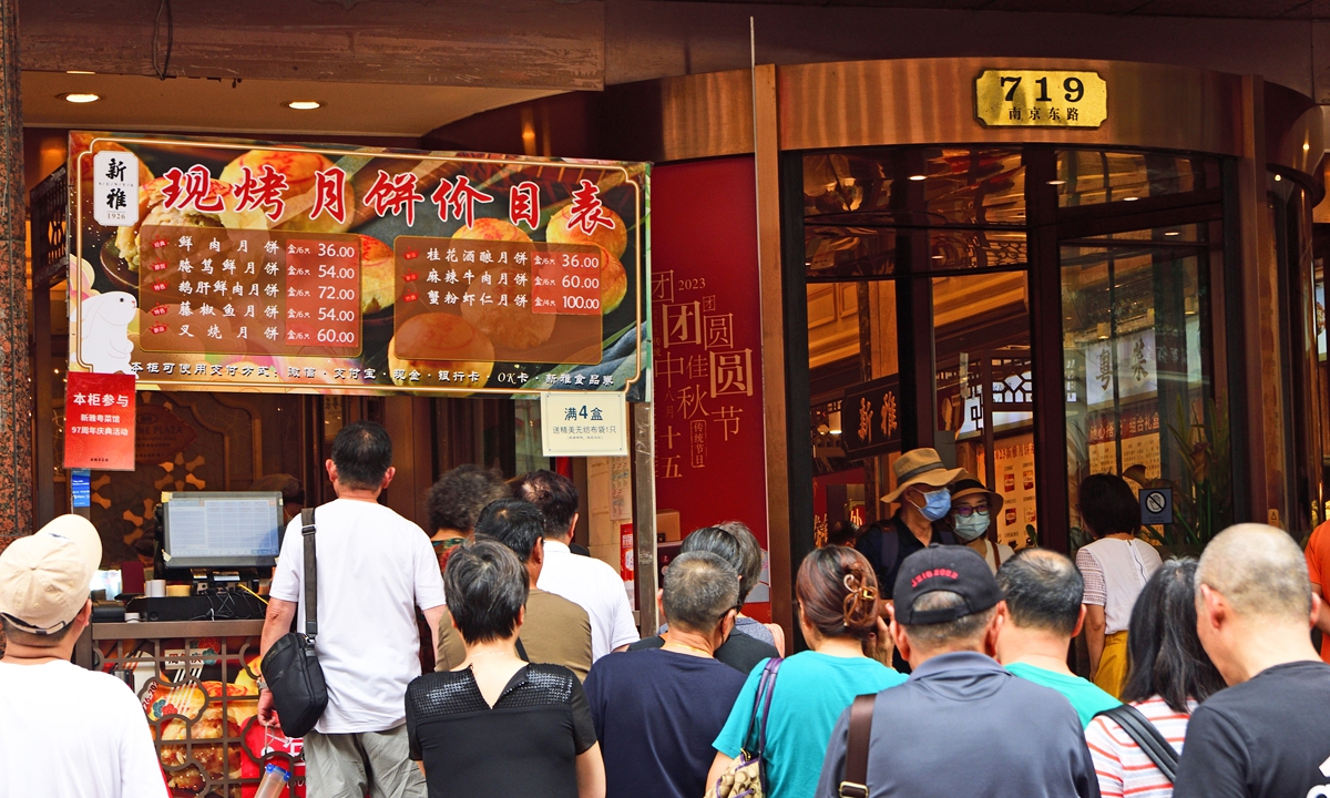 Residents and tourists line up to buy mooncakes in front of a time-honored food store in Shanghai on September 12, 2023 as the Chinese Mid-Autumn Festival approaches. This year's Mid-Autumn Festival falls on September 24. It is one of the most important holidays in Chinese culture. The roundness of the moon represents the reunion of the family in Chinese thinking. Photo: VCG