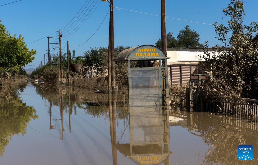 Photo taken on Sept. 12, 2023 shows a flooded road in the village of Metamorfosi, Karditsa, Greece. Regions in central Greece are on alert for the impact of the recent floods on public health, local officials said on Tuesday. Fifteen people died and 4,570 were evacuated to safety during the floods, according to the Fire Brigade.(Photo: Xinhua)