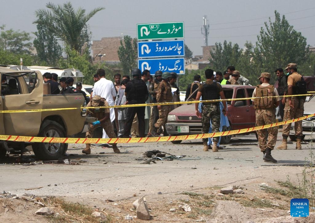 Security personnel examine the explosion site in northwest Pakistan's Peshawar on Sept. 11, 2023. Seven security members and four civilians were injured when a bomb went off in Pakistan's northwest Khyber Pakhtunkhwa province on Monday, rescue teams and police said.(Photo: Xinhua)