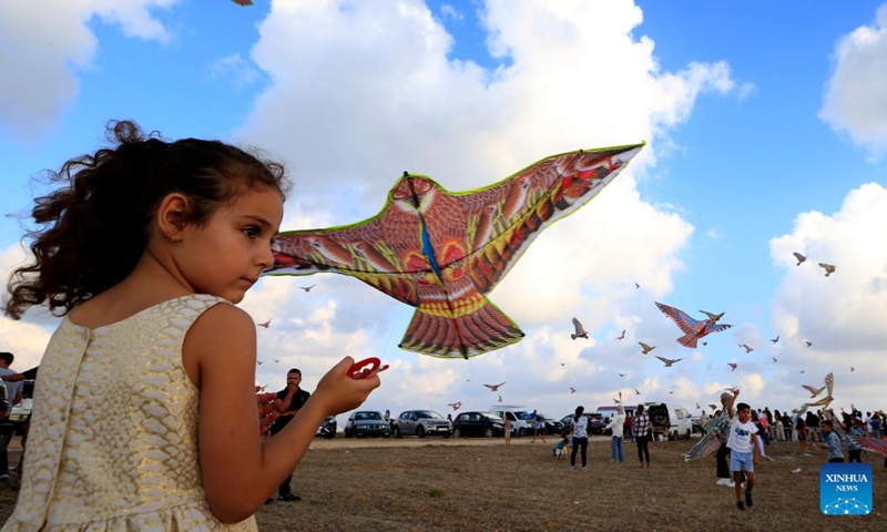 People fly kites during a kite festival in the town of Zrarieh, Lebanon, on Sept. 10, 2023.(Photo: Xinhua)