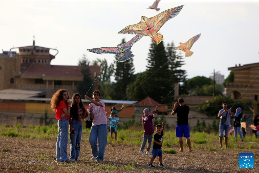 People fly kites during a kite festival in the town of Zrarieh, Lebanon, on Sept. 10, 2023.(Photo: Xinhua)