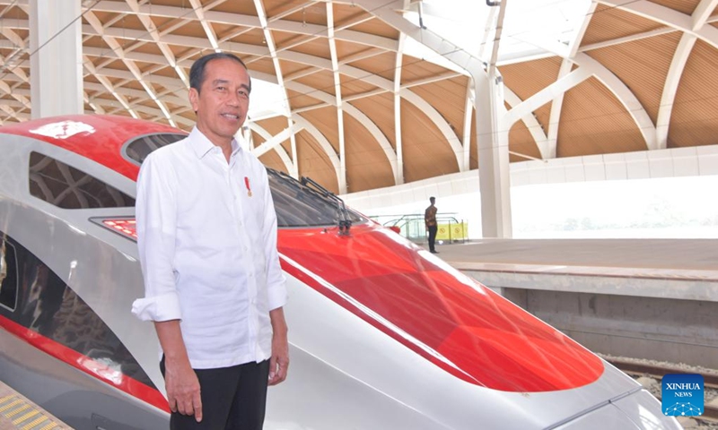 Indonesian President Joko Widodo poses for photos with a high-speed electric multiple unit (EMU) train on the platform of Halim Station of the Jakarta-Bandung High-Speed Railway in Jakarta, Indonesia, Sept. 13, 2023. Indonesian President Joko Widodo took a ride Wednesday on the Jakarta-Bandung High-Speed Railway (HSR), a landmark project under the China-proposed Belt and Road Initiative.(Photo: Xinhua)