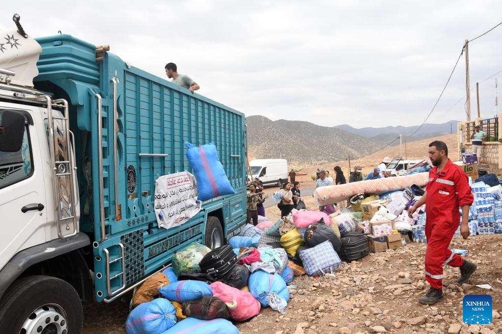 Rescuers carry supplies in Moulay of Al Haouz Province, Morocco, Sept. 12, 2023. The death toll from the devastating earthquake in Morocco has risen to 2,901, and the injuries to 5,530, according to the latest statement released by the Moroccan government on Tuesday.(Photo: Xinhua)