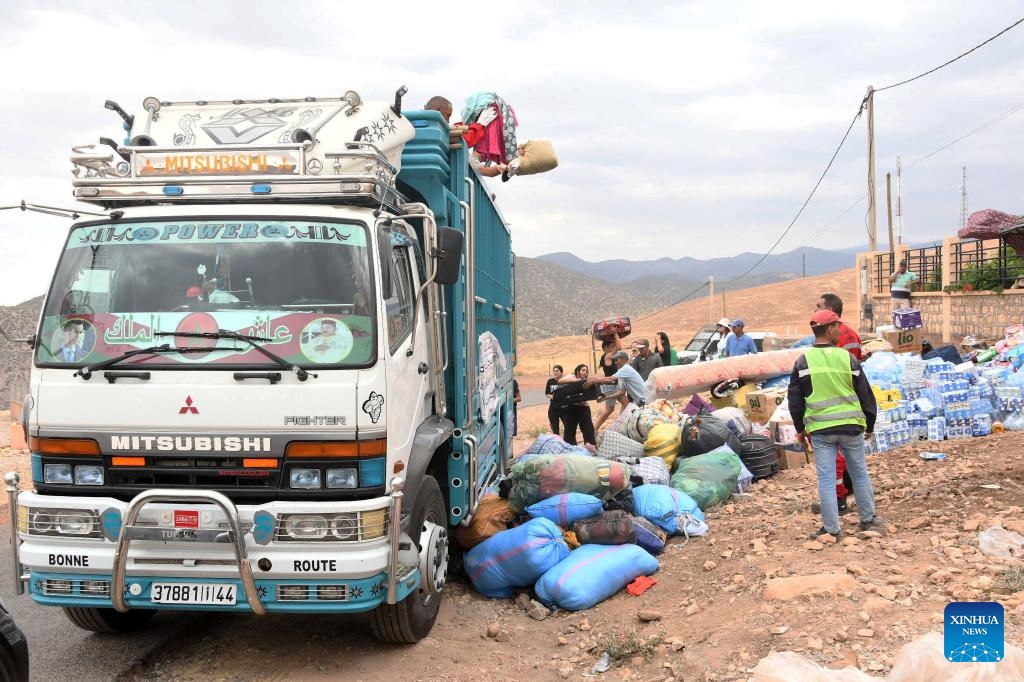 Rescuers carry supplies in Moulay of Al Haouz Province, Morocco, Sept. 12, 2023. The death toll from the devastating earthquake in Morocco has risen to 2,901, and the injuries to 5,530, according to the latest statement released by the Moroccan government on Tuesday.(Photo: Xinhua)