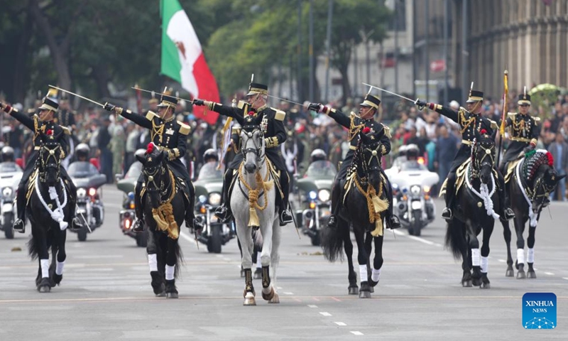 Soldiers participate in a military parade for the 213th anniversary of Mexico's Independence Day at the Zocalo Square in Mexico City, Mexico, on Sept. 16, 2023. (Photo by Francisco Canedo/Xinhua)