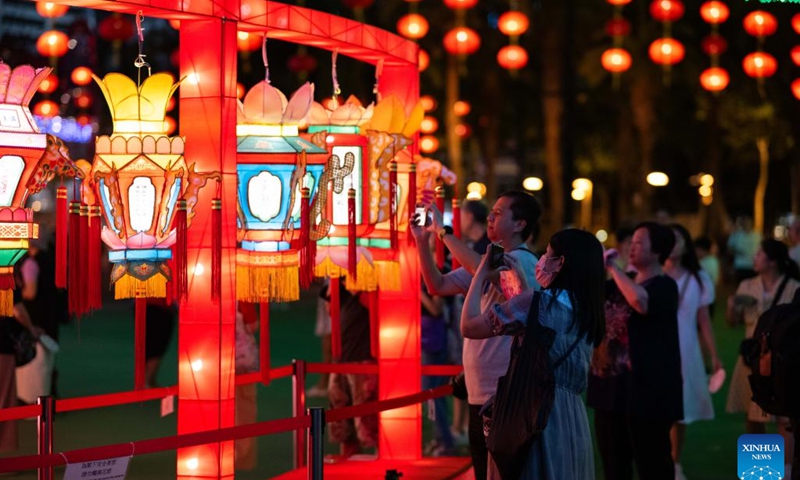 People visit a Mid-Autumn lantern fair at Victoria Park in Hong Kong, south China, Sept. 23, 2023. (Xinhua/Zhu Wei)