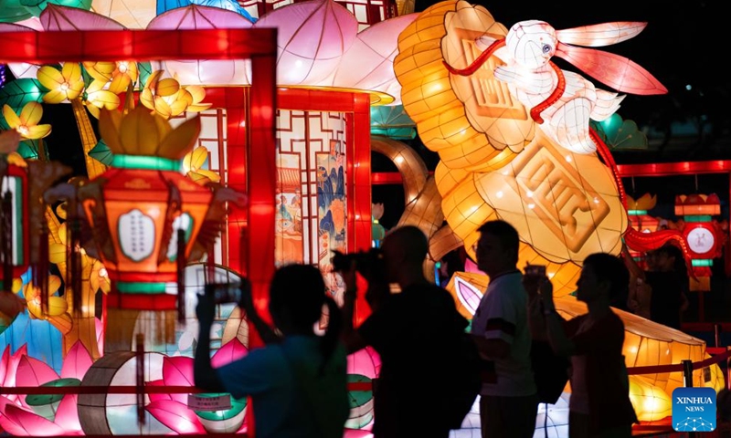 People visit a Mid-Autumn lantern fair at Victoria Park in Hong Kong, south China, Sept. 23, 2023. (Xinhua/Zhu Wei)