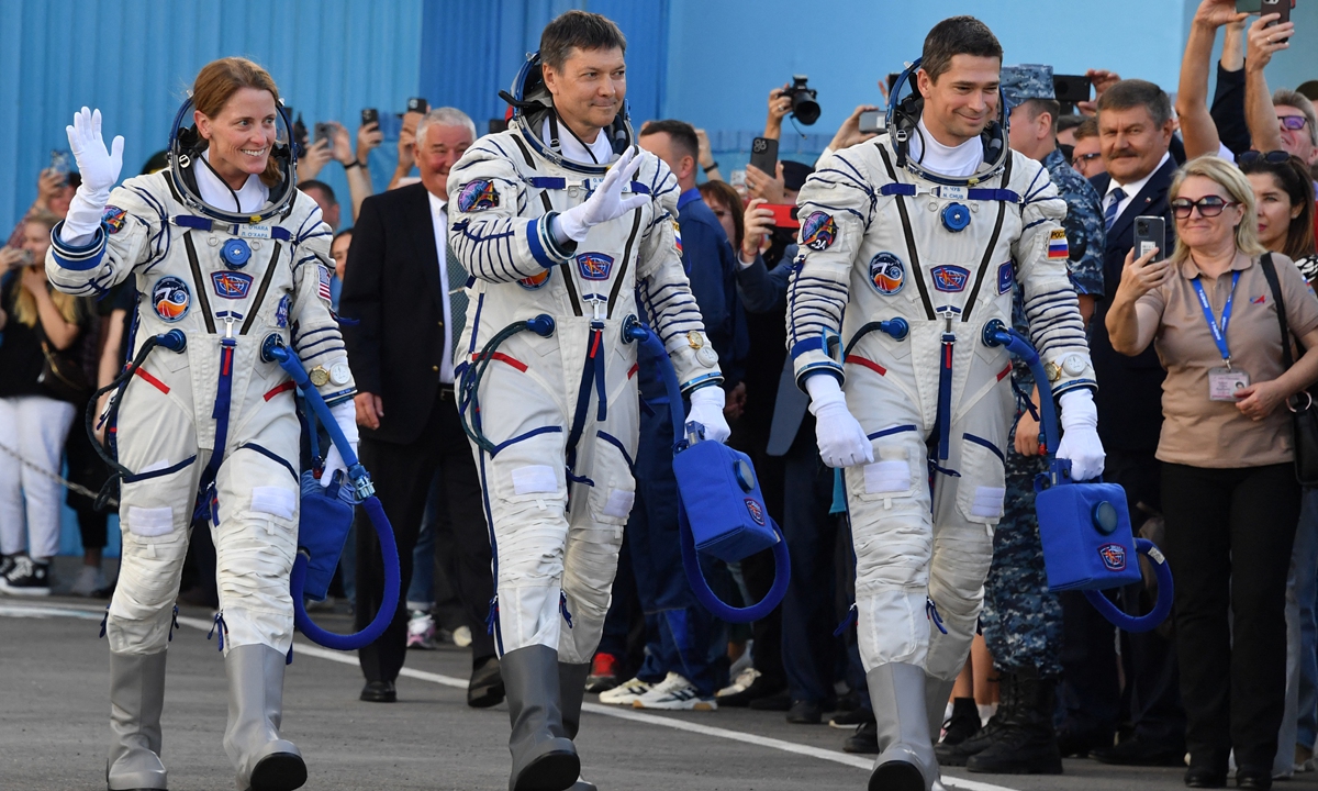 (From left) US NASA astronaut Loral O'Hara and Russian Roscosmos cosmonauts Oleg Kononenko and Nikolai Chub, members of the International Space Station (ISS) Expedition 70-71 main crew, walk to report to the head of the Russian space agency Roscosmos during the pre-launch preparations in the Russian leased Baikonur cosmodrome in Kazakhstan on September 15, 2023. The trio is scheduled to launch aboard their Soyuz MS-24 spacecraft later on September 15. Photo: AFP