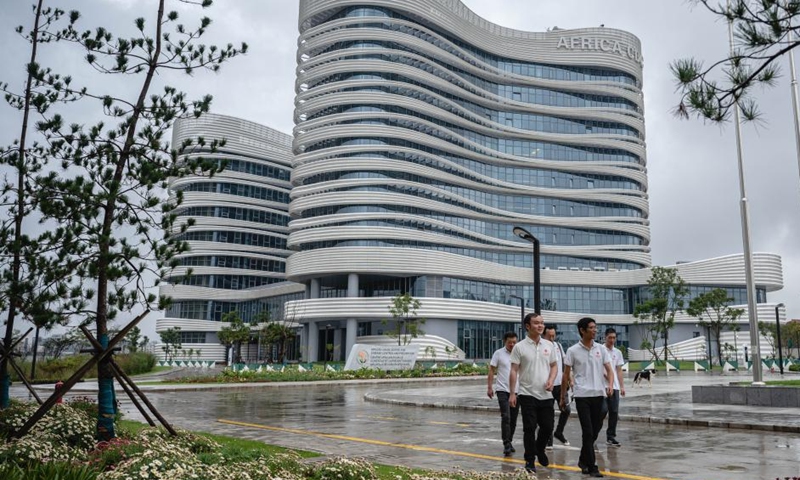 Staff members of the Chinese technical service team walk at the headquarters of the Africa Centers for Disease Control and Prevention (Africa CDC) in Addis Ababa, Ethiopia, Sept. 11, 2023. Located in the southern suburbs of Addis Ababa, the China-aided headquarters of the Africa CDC was officially inaugurated in January 2023.(Photo: Xinhua)