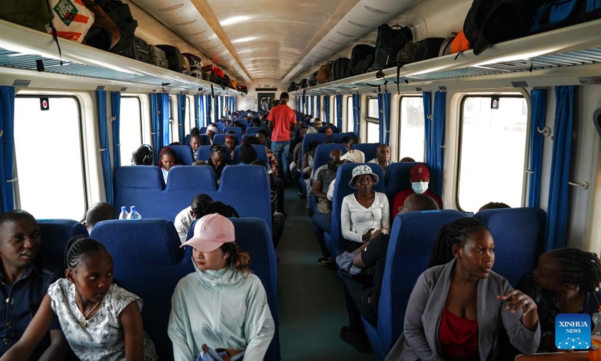 Passengers are seen in the train to Mombasa at Nairobi Terminus Station of the China built Mombasa-Nairobi Standard Gauge Railway (SGR) in Nairobi, Kenya, Sept. 20, 2023.  (Xinhua/Han Xu)












