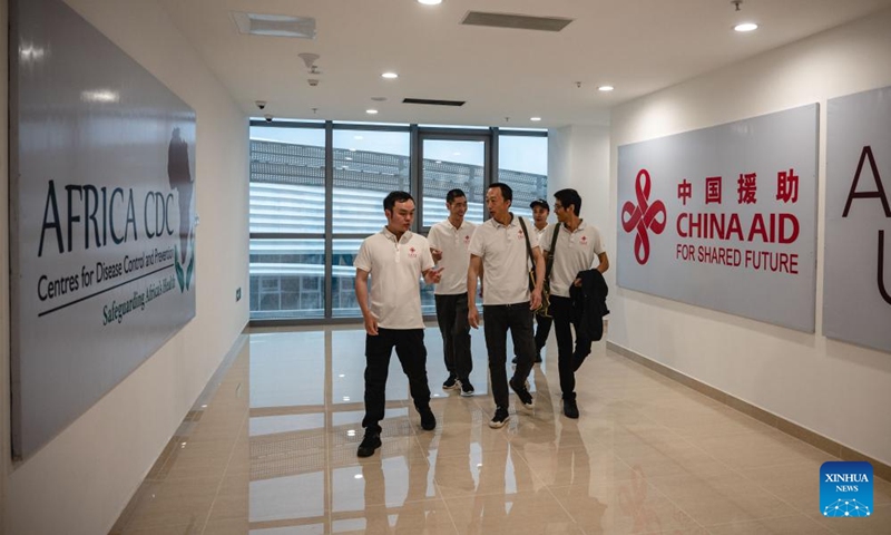 Staff members of the Chinese technical service team work at the headquarters of the Africa Centers for Disease Control and Prevention (Africa CDC) in Addis Ababa, Ethiopia, Sept. 11, 2023. Located in the southern suburbs of Addis Ababa, the China-aided headquarters of the Africa CDC was officially inaugurated in January 2023.(Photo: Xinhua)