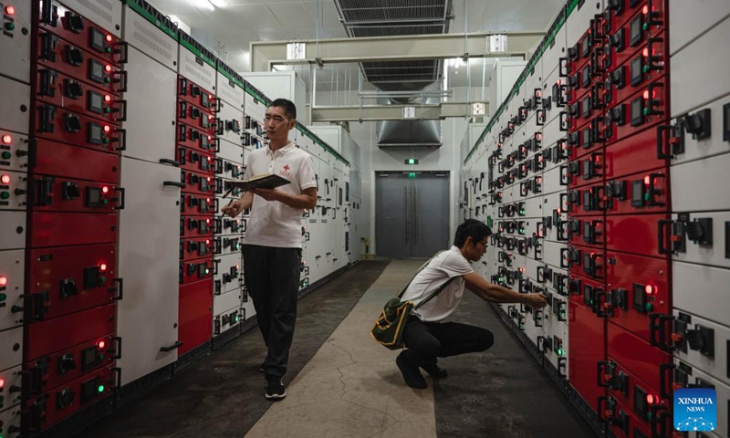 Staff members of the Chinese technical service team work at the headquarters of the Africa Centers for Disease Control and Prevention (Africa CDC) in Addis Ababa, Ethiopia, Sept. 11, 2023. Located in the southern suburbs of Addis Ababa, the China-aided headquarters of the Africa CDC was officially inaugurated in January 2023.(Photo: Xinhua)