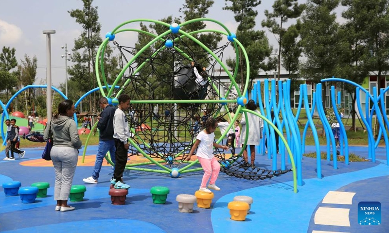 Children have a fun time at a playground in Addis Ababa, Ethiopia, Sept. 16, 2023. As an integral part of the Ethiopian government's city beautification agenda, the China-aided Addis Ababa riverside green development project is expected to greatly improve the surrounding living environment of Addis Ababa, the capital of Ethiopia, with important social, tourism and commercial value. (Xinhua/Wang Ping)