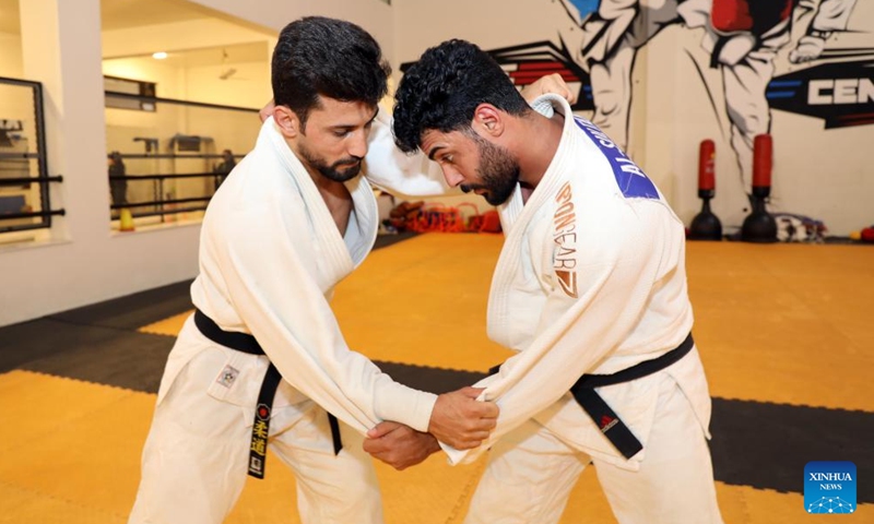 Athletes of the Iraqi judo team train in preparation for Hangzhou Asian Games at the Baghdad Sports Center in Baghdad, Iraq, Sept. 14, 2023. (Xinhua/Khalil Dawood)

