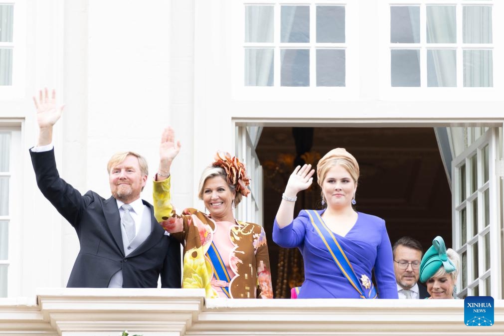 Dutch King Willem-Alexander, Queen Maxima, and Princess Amalia (from L to R) wave to people on the balcony of Noodeinde Palace in The Hague, the Netherlands, on Sept. 19, 2023. The third Tuesday in September is Prince's Day in the Netherlands. It marks the opening of the Dutch parliamentary season, and on this day the reigning monarch outlines the government's plans for the year ahead.(Photo: Xinhua)