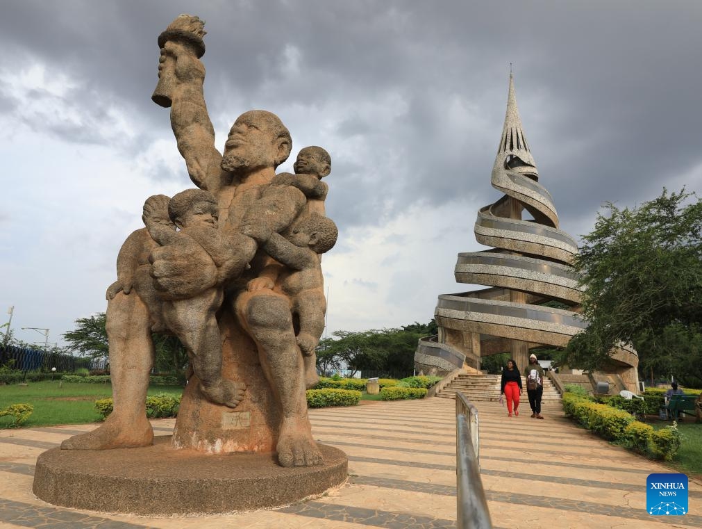 This photo taken on Sept. 14, 2023 shows the Reunification Monument (R) and a sculpture in Yaounde, Cameroon. Situated on the hilly areas of central Cameroon at an altitude of 750 meters, Yaounde is the capital and second largest city in Cameroon.(Photo: Xinhua)