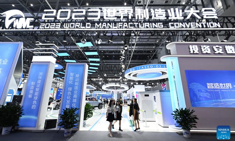 People visit the 2023 World Manufacturing Convention in Hefei, east China's Anhui Province, Sept. 20, 2023. The 2023 World Manufacturing Convention kicked off Wednesday in Hefei, built around the theme Intelligent manufacturing for a better future. With a record number of exhibitors, the five-day event features activities as exhibitions, summits and forums.(Photo: Xinhua)