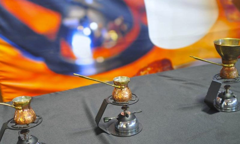 Photo taken on Oct. 5, 2023 shows copper kettles for brewing coffee with traditional methods at the international coffee exhibition Spring of Coffee in Tunis, Tunisia. (Photo by Adel Ezzine/Xinhua)